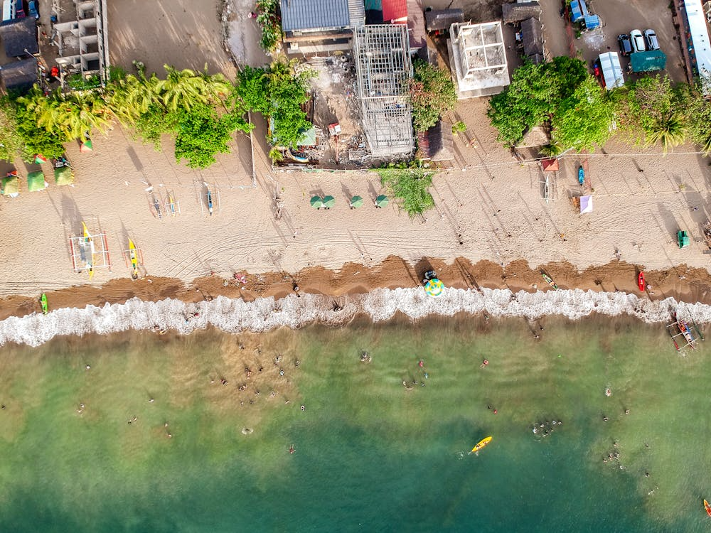 Bali beaches featuring golden sands, crystal-clear waters, and stunning coastal scenery, offering the perfect setting for relaxation, swimming, and seaside adventures.