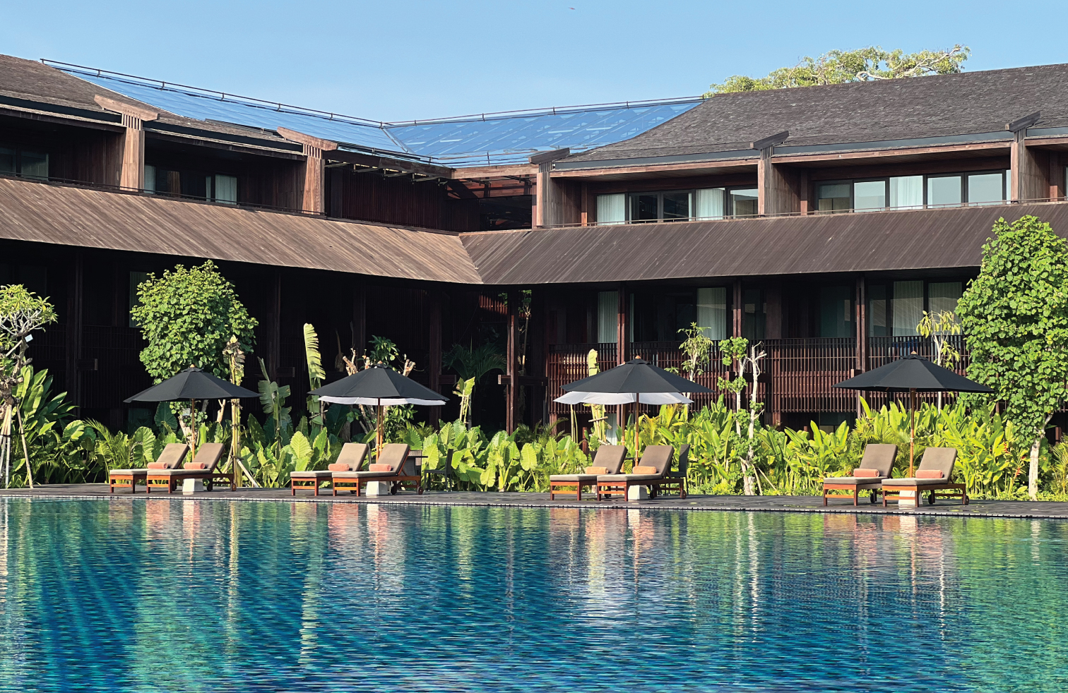 Beachfront hotel in Bali showcasing luxury accommodations steps from the shoreline