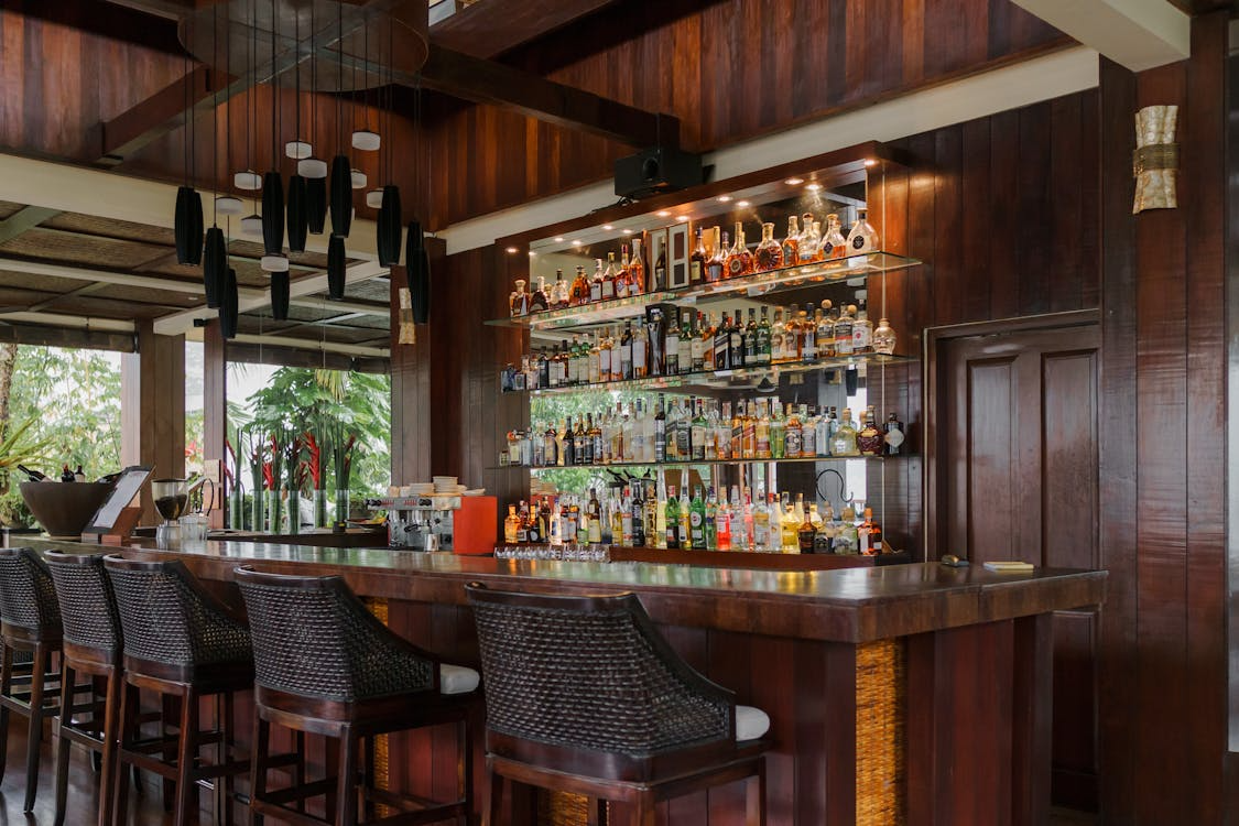 Guests enjoying the best bars in Bali, featuring vibrant atmospheres, premium drinks, sunset experiences, and unique nightlife destinations across the island.