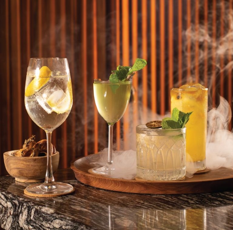 Guests enjoying the best bars in Bali, featuring vibrant atmospheres, premium drinks, sunset experiences, and unique nightlife destinations across the island.