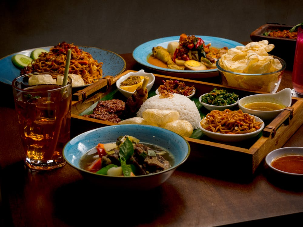 Diners enjoying the best Indonesian restaurants Bali, featuring local specialties, fresh ingredients, and inviting settings that celebrate Indonesian food culture.