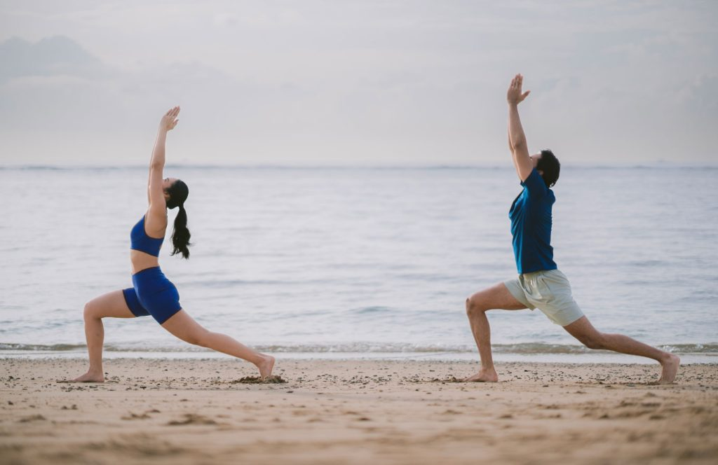 Travelers enjoying wellness activities in Bali, from sunrise yoga and sound healing to nature walks and rejuvenating spa rituals in tranquil tropical settings.