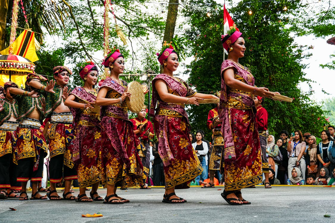 Visitors experiencing festivals in Bali through lively parades, music events, dance performances, and unique cultural festivities held throughout the year.