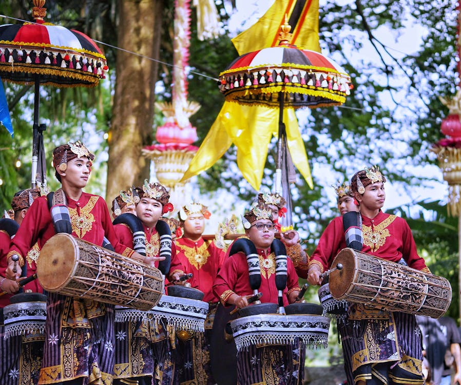 Visitors experiencing festivals in Bali through lively parades, music events, dance performances, and unique cultural festivities held throughout the year.