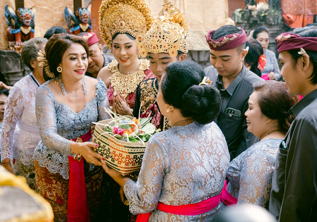 Visitors experiencing festivals in Bali through lively parades, music events, dance performances, and unique cultural festivities held throughout the year.