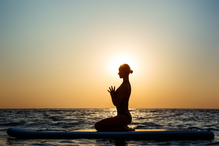 Travelers enjoying the best things to do in Bali, from surfing and snorkeling to visiting waterfalls, local markets, and iconic sunset viewpoints.