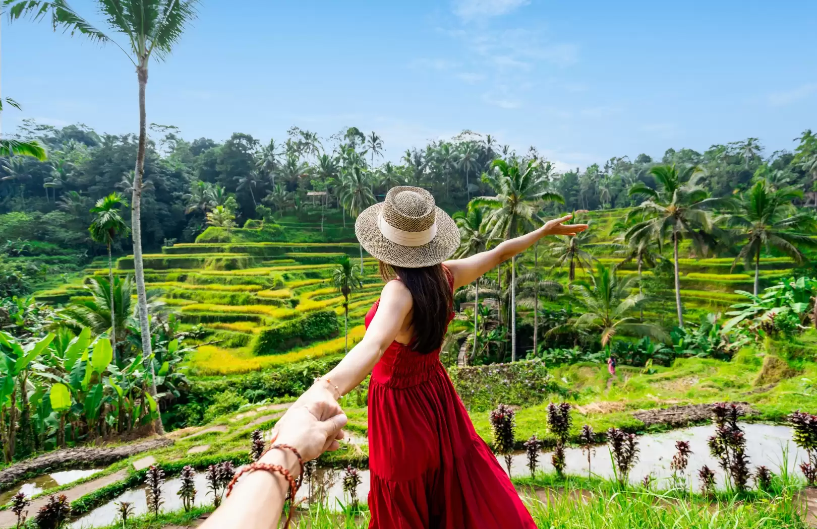 Family exploring a tropical garden with activities perfect for things to do in Bali with kids
