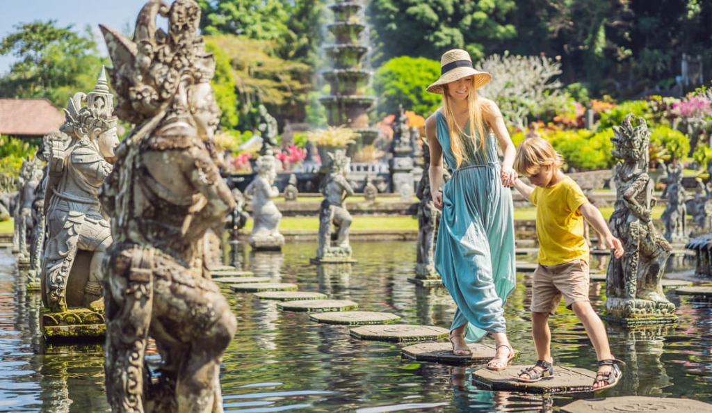Family exploring a tropical garden with activities perfect for things to do in Bali with kids