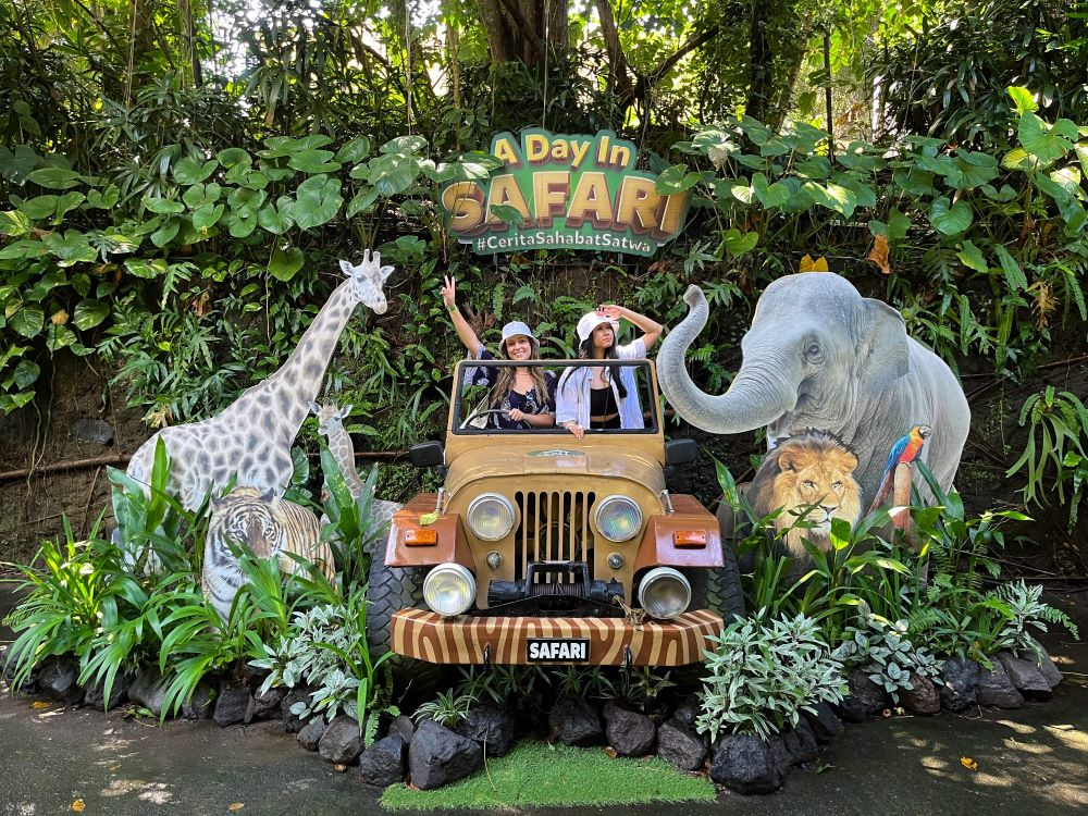 Parents and children visiting a Bali cultural attraction, one of the top things to do in Bali with kids